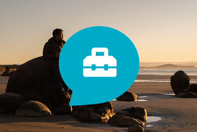 Background of people looking to sea with Boxed icon overlaid