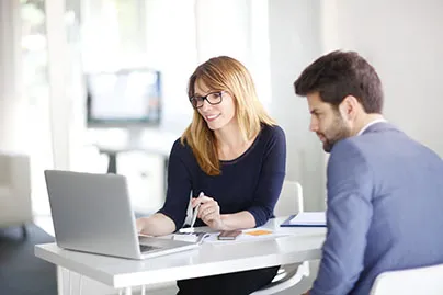 Blog image - two people looking at a computer screen
