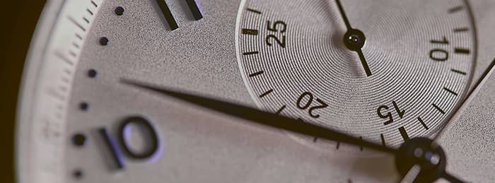 Closeup of an analogue clock face